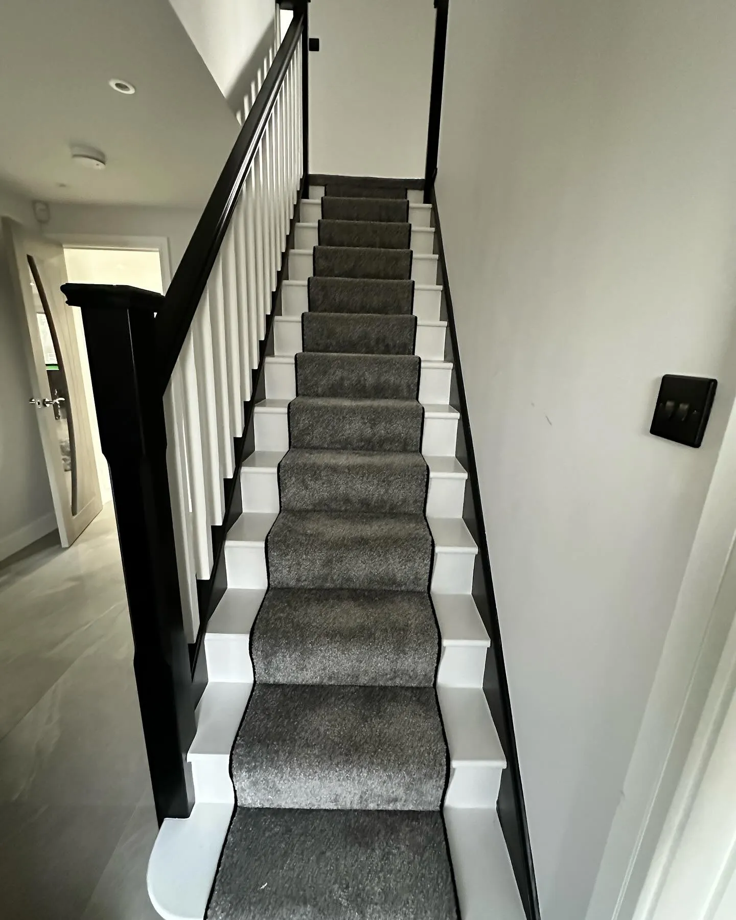 A set of stairs leading up to a second floor.