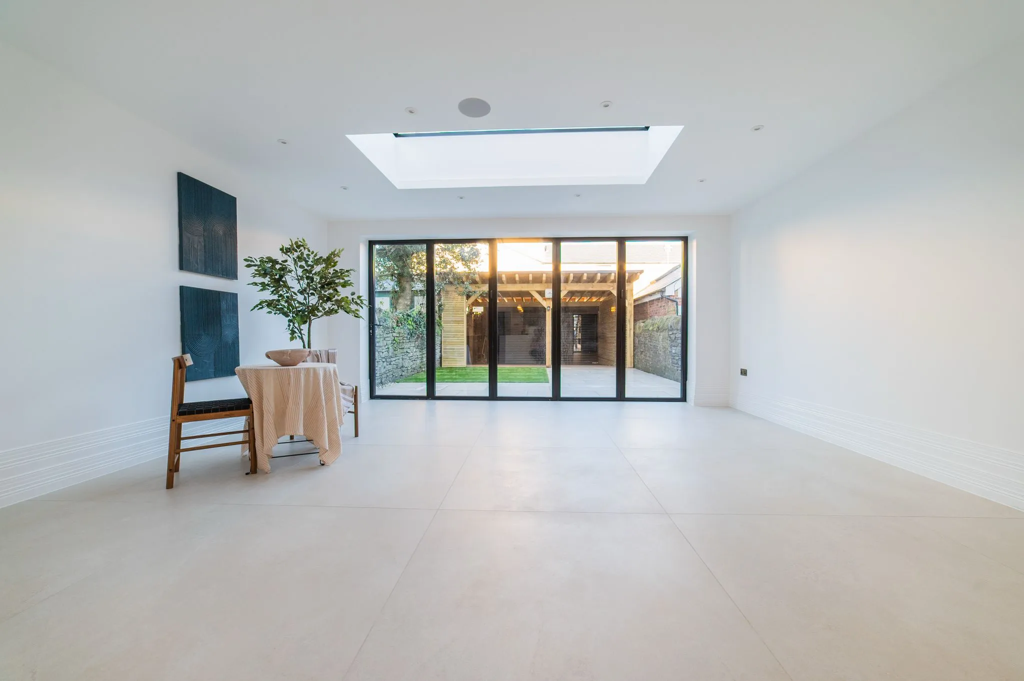 large open black doors in long room