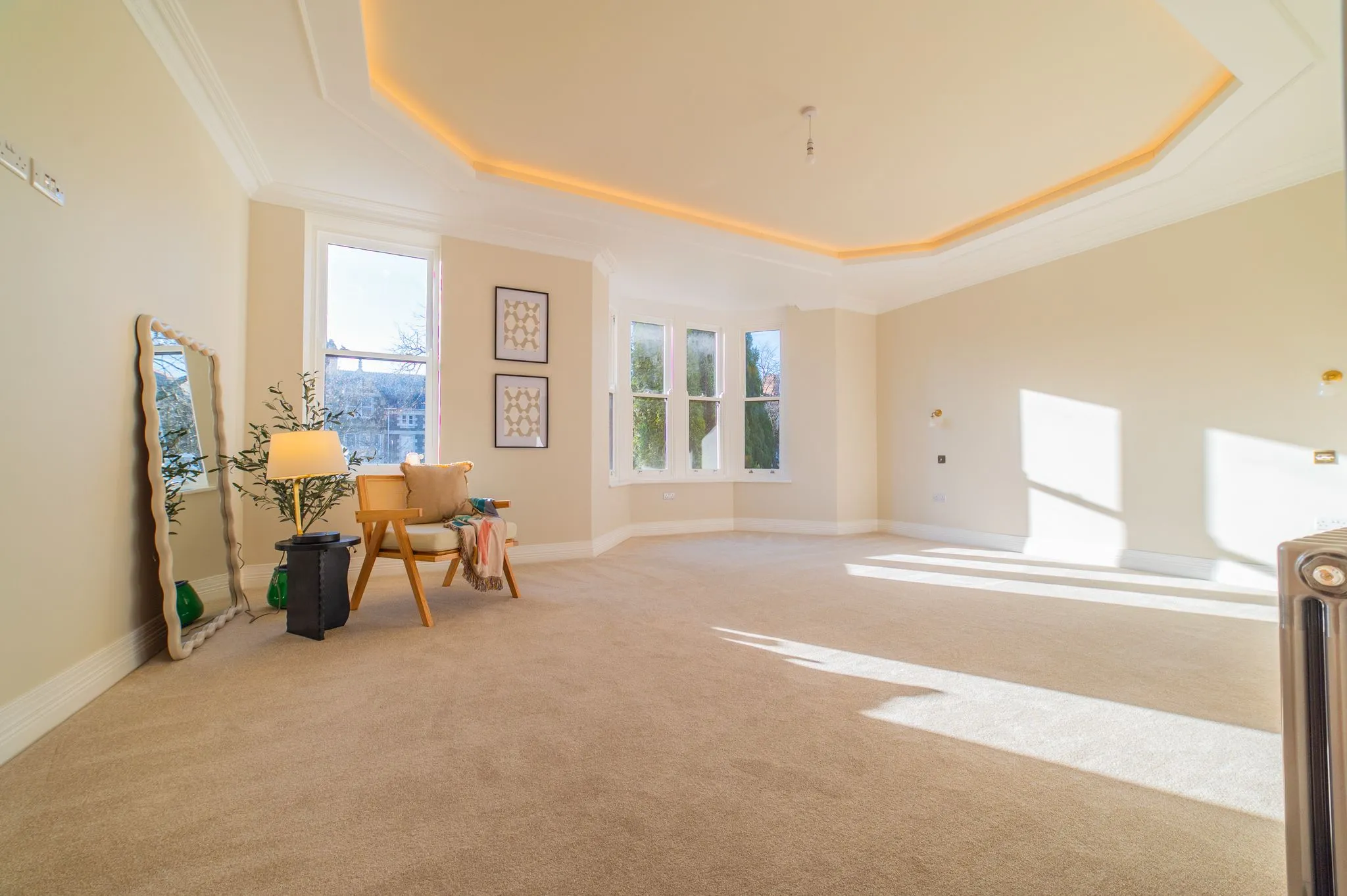 large area with small chair and desk 